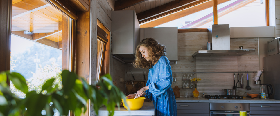 woman preparing food in kitchen 